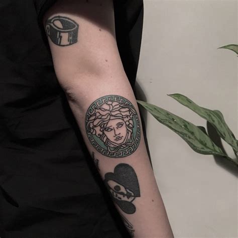 versace logo tattoo